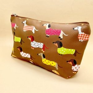 Portacosmetico perro salchicha