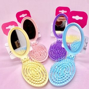 Cepillo plegable con espejo