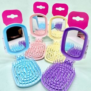 Cepillo plegable con espejo